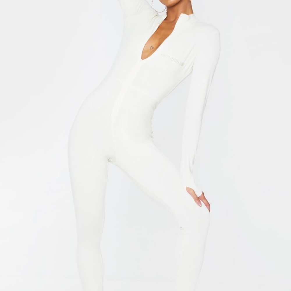 PRETTYLITTLETHING Cream Embroidered Zip Front Catsuit